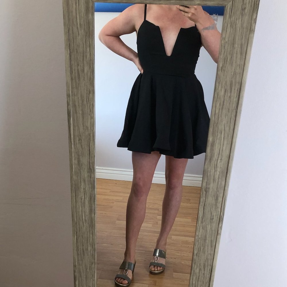 Reve Boutique spaghetti strap mini dress in black, medium, original tags.